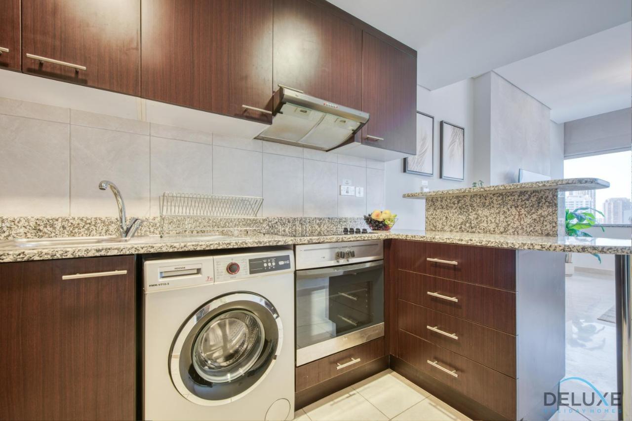 Calm Studio At Sky Gardens Difc By Deluxe Holiday Homes Dubai Eksteriør billede
